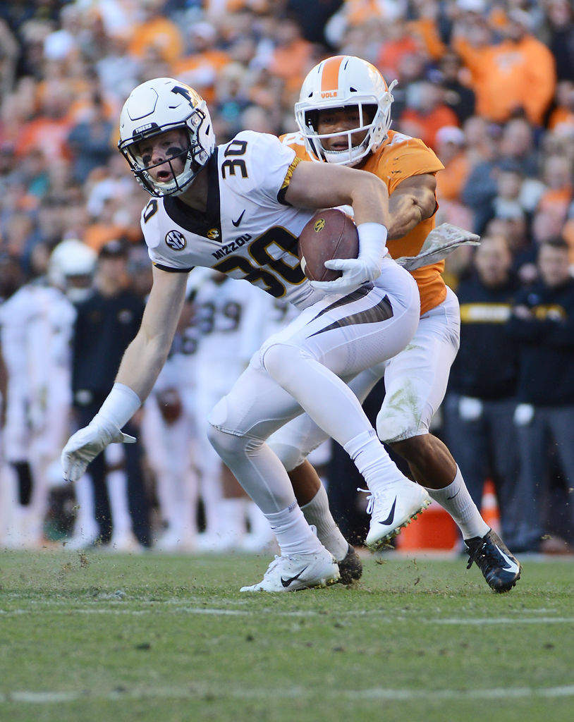 Missouri wide receiver Barrett Banister attempts to break a tackle